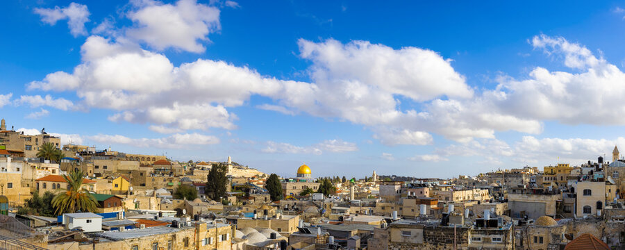 panoramic skyline of jerusalem old city arab quarter near western wall and dome of the rock.