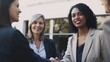 © Get Stock - Professional Workplace Female Women: Multiracial Social workers Greeting with Confidence Friendliness in Business Setting, Diversity Equity Inclusion DEI Celebration (generative AI