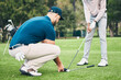 © Clayton D/peopleimages.com - Teaching, golf lesson and sports coach help man with swing, driver or stroke outdoor. Coaching, course and club support of athlete men ready to start golfing exercise, workout and training for game.