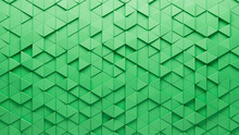 3D Tiles Arranged To Create A Futuristic Wall. Triangular, Polished Background Formed From Green Blocks. 3D Render