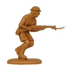 British Plastic Soldier From The Second World War Attacking With Rifle And Bayonet. Boys Toys From The 70s And 80s
