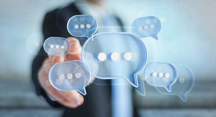 Wall Mural - Man touching with his fingers digital speech bubbles talk icons. Minimal conversation or social media messages floating in front of businessman hand. 3D rendering
