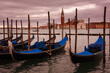 © Maresol - Gondolas in Venice on sunset next to San Marco square. Famous landmark in Italy