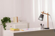 © New Africa - Stylish teenager's workplace with desk, lamp and stationery