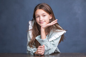 Wall Mural - Studio portrait of a young teen girl