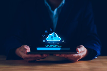 Wall Mural - data upload to cloud storage computing concept. man using smartphone and computer to upload and down