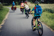 canvas print picture - Familie auf einer Fahrradtour durch Niedersachsen in den Sommerferien, Deutschland