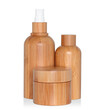 Wooden cosmetic dropper bottles and jar isolated white background. Eco cosmetics and zero waste concept 