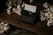 © ADDICTIVE STOCK - Interior of vintage cabinet with typewriter and crumpled papers