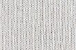 © สัมฤทธิ์ ไกรยนุช - Close-up of cream-colored knit fabric for backgrounds and designs.