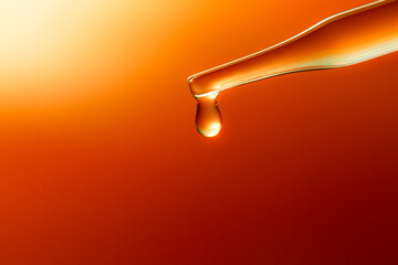 Wall Mural - macro science experiment pipette surface,top view macro shot of chemical dropper injects oil into cl