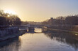 Early morning view of river Tiber  and Ponte Garibaldi bridge in Rome, Italy