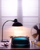 Fototapeta Miasto - 60s typewriter on desk with lamp