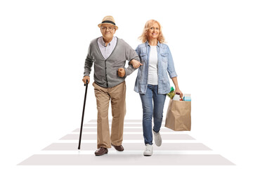 Poster - Woman crossing street and helping her senior father with grocery bags