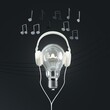 Closeup Lighting bulb Floating put on headphones isolate on black color background with line melody music note. Minimal idea concept. 3D Render.

