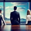 © Manmeet - Business people looking out the boardroom window