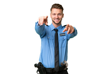 Wall Mural - Young police man over isolated background points finger at you while smiling