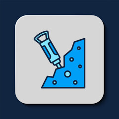 Poster - Filled outline Construction jackhammer and stone icon isolated on blue background. Vector