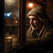 Generative AI - A homeless man looking out a window at the street at night with a lit candle in the window, cinematic photography, a character portrait, neoplastic