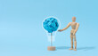 Wooden puppet and crumpled ball of paper, search for new solutions and ideas, brainstorming