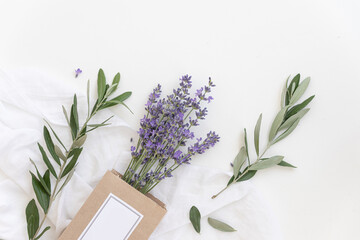 Wall Mural - Lavender product presentation. Lavender flowers on a white background. Top view concept.