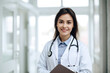 © aicandy - Portrait of a smiling female doctor in her white coat and stethoscope around her neck, holding a clipboard with medical records, generative ai