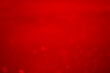 © niwat - red glitter vintage lights background. red bokeh shiny on dark background.
