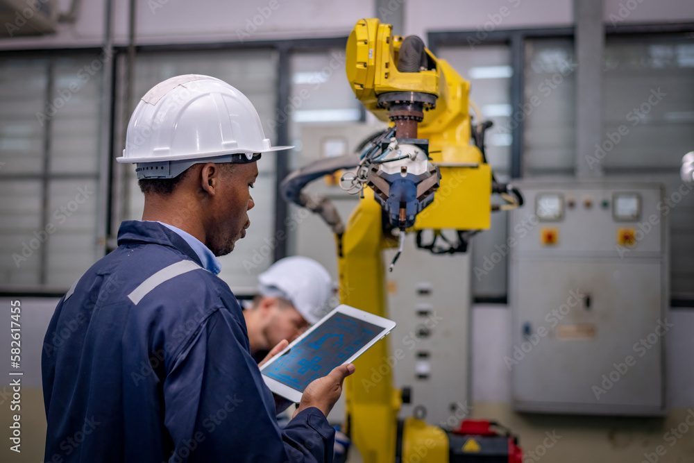 Engineer factory industry wearing safety uniform work and checking ...