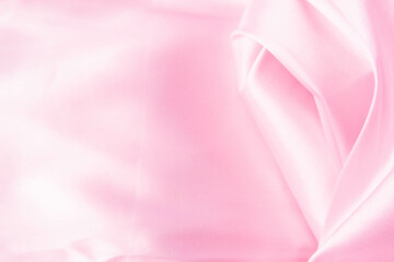 abstract background of luxury pastel pink fabric, folded textile or liquid wave or wavy folds silk t