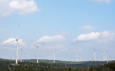Wall Mural - Wind generator turbines at wind farm. Alternative energy concept.