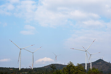 Wall Mural - Wind generator turbines at wind farm. Alternative energy concept.