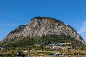 Wall Mural - Sanbang Mountain and blue sky in Jeju Island