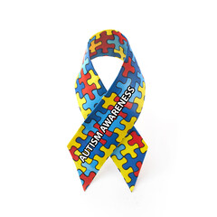 Wall Mural - World Autism awareness and pride day or month with Puzzle pattern ribbon on white background