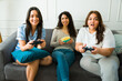 © AntonioDiaz - Excited women playing video games having fun