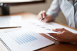 © mojo_cp - Image of woman calculate tax invoice at home, summarizing taxes, money planing..