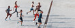 © gstockstudio - Top view of young people in sports clothing jogging outdoors together