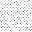 Dotted seamless pattern. Monochrome circles with different opacity  repeat and size on white background. Vector illustration. 