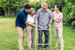 © Art_Photo - Portrait enjoy happy smiling love multi-generation asian big hug family.Senior mature father and elderly mother with young adult woman and son outdoor in park at home.insurance concept