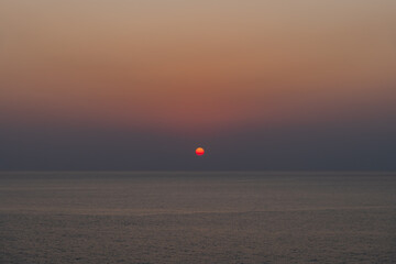 Wall Mural - sun, beautiful sea water on sunset sky.