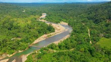 Aerial Footage Of An Amazonian Shallow Wetland And A Small Bridge Connecting The Rainforests