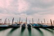 Beautiful blurred view of multiple boats at the port on a cloudy day