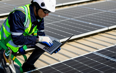 Wall Mural - Professional engineer technician with safety helmet checking solar panels