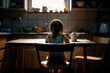 © The Blue Wave - Children are affected by social problems. A child sitting alone at an empty dining table in the kitchen. Back view. Generative AI
