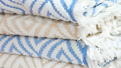 Leinwandbilder - Colorful folded towels stack closeup picture, hotel service concept background