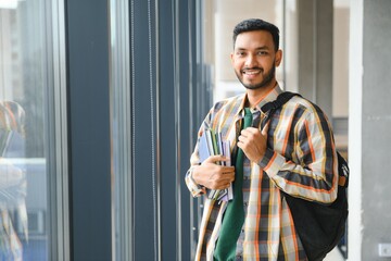 Poster - Happy indian male student at the university