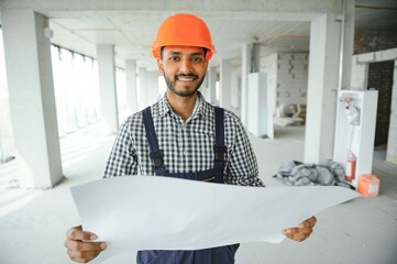 Portrait of a Indian engineer posing at the camera