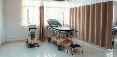 Wall Mural - Sterile recovery room equipped with comfortable modern medical sickbed for patient recovery. Photo of a hospital bedroom or ward for patient treatment for medical usage.