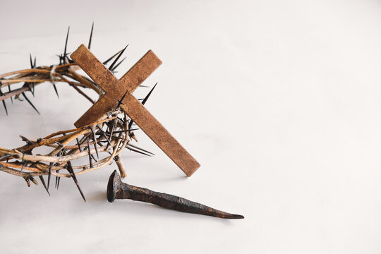 jesus crown thorns and nails and cross on a white background. crucifixion of jesus christ. passion o