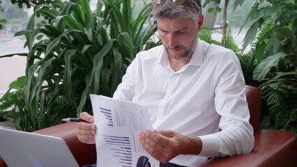 Wall Mural - business man works with financial documents . close-up.