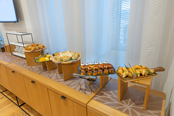 Food served on a banquet table in a meeting room